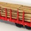 Piko Plošinový vagón Roos-t642 s klanicemi a nákladem dřeva DB AG V - 54339